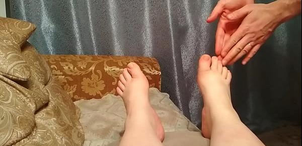 Footjob from curvy amateur MILF